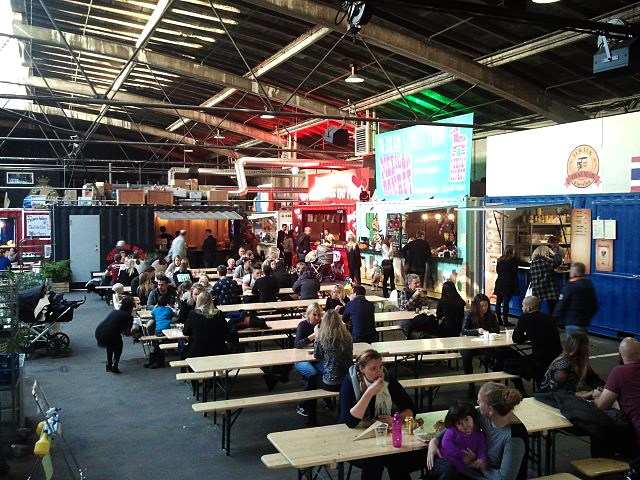 The former shipping containers on the back are now working as kitchens in the Aarhus Street Food area.