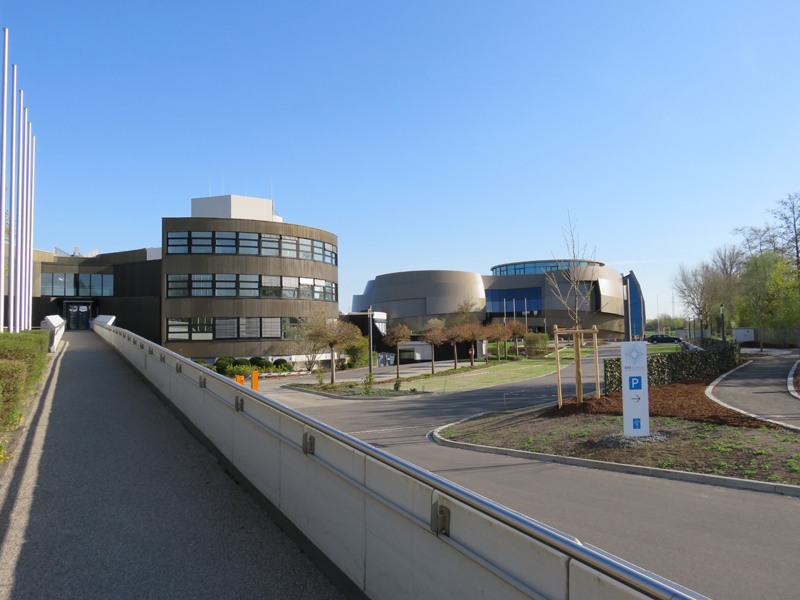 View of the main entrance of ESO Headquarters with ESO Supernova next to it. Copyright: Claudia Neeser.