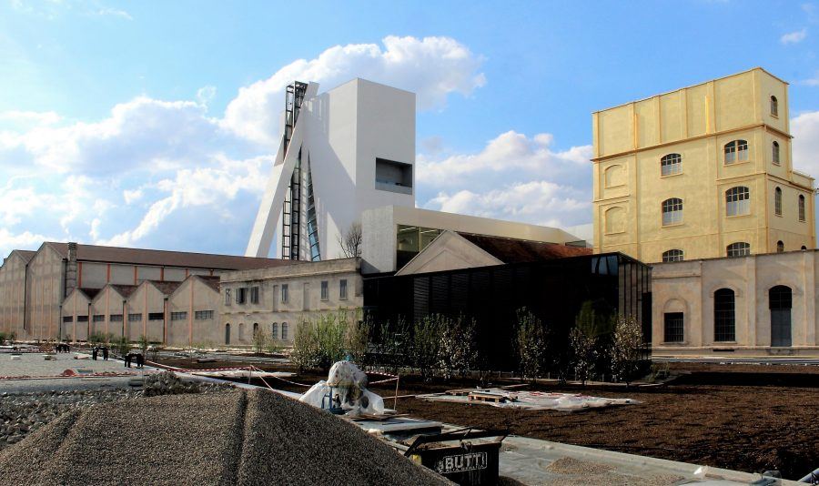 Torre and the Haunted House seen from the new public garden - Fondazione Prada by OMA. Copyright: Carlo Berizzi.
