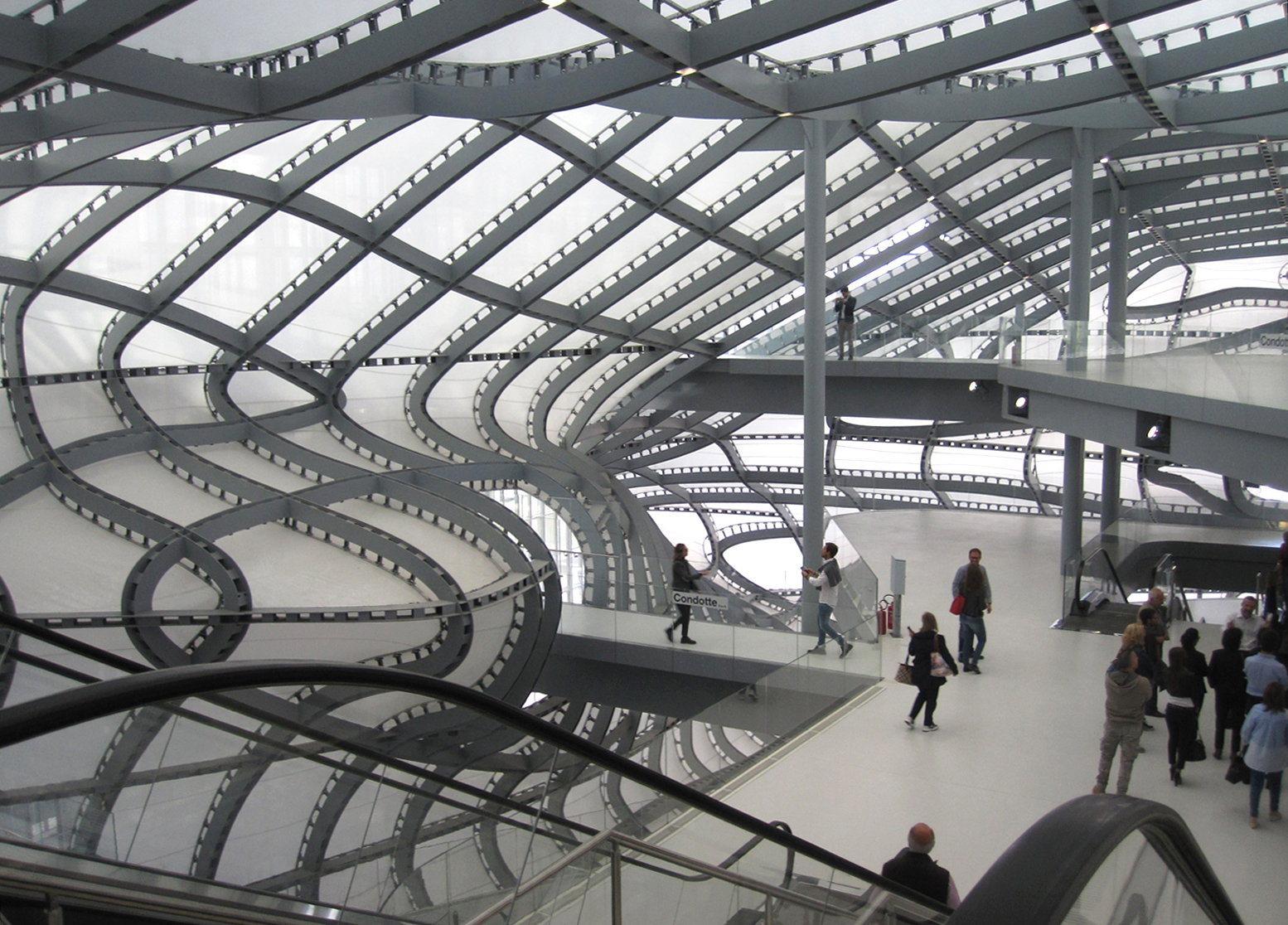 The curvilinear indoors of the new hotel and congress center in Rome's EUR district