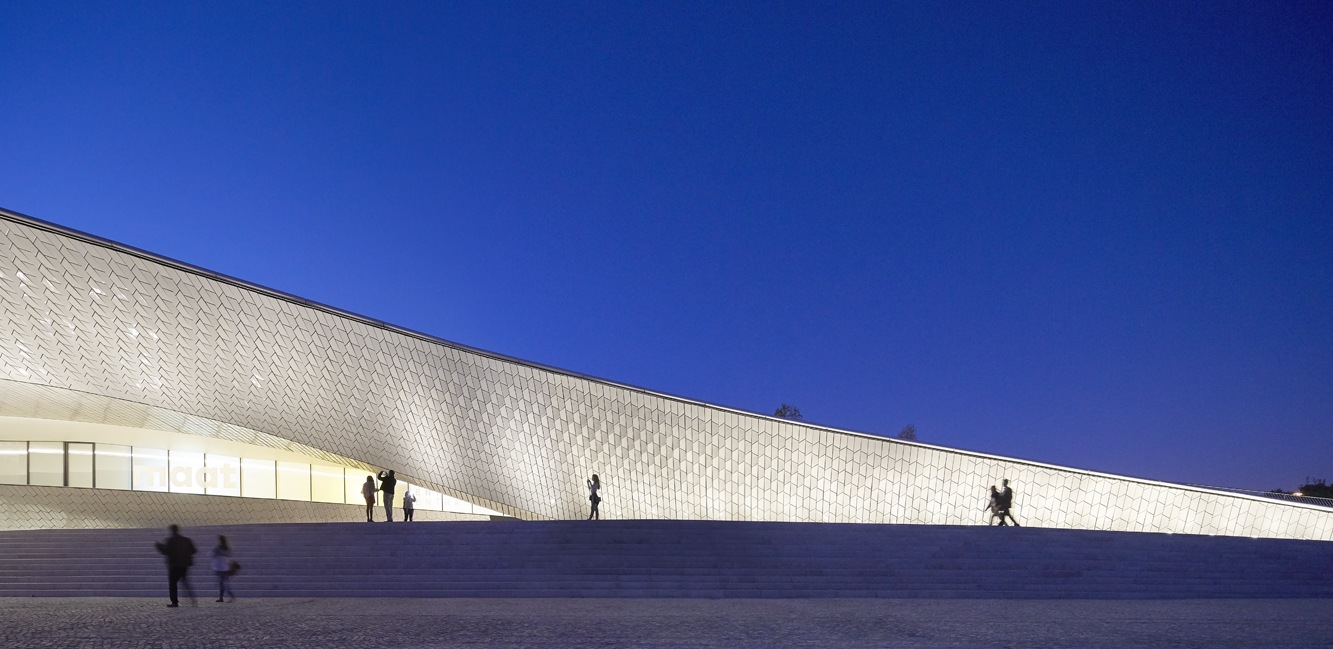 A nocturnal perspective on part of the 15.000 glazed tiles that cover MAAT, in Lisbon.