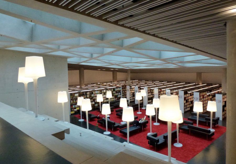 The reading-staircase at the library, in the basement of the Unipark Nonntal, gets light from the glazed ramp of the entrance above.