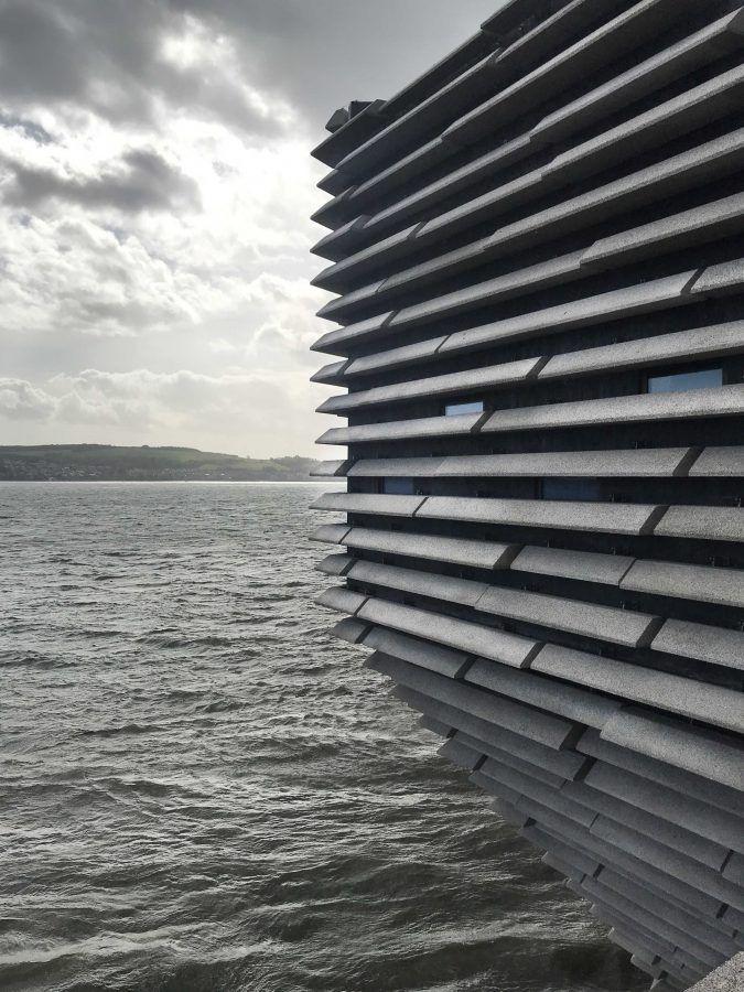 The façade of the V&A Dundee as it meets the River Tay in Dundee. Photo by: ©Dress for the Weather