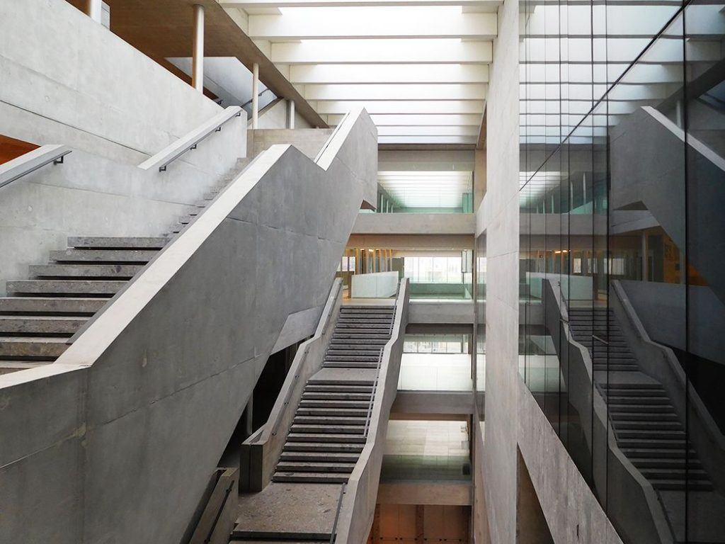 Staircases and terraces at different levels carve the inner space. Grafton Architects, Bocconi University, Milan. Photo by ©Carlo Berizzi