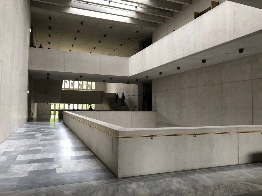 View through the central hall in the first floor towards the door to the ‘garden of art’. Photo by: ©Kristin Müller - Kunsthaus extension by Chipperfield