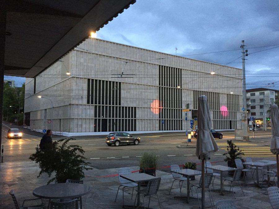 View to the main facade of the Heimplatz during dawn with some light art by Pipilotti Rist. Photo by: ©Barbara Petri - Kunsthaus extension by Chipperfield